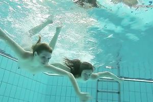 Two cute white hawt college cuties from Russian Federation below water