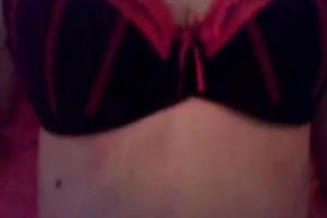 Busty dark brown in straps and nylons is posing for a webcam