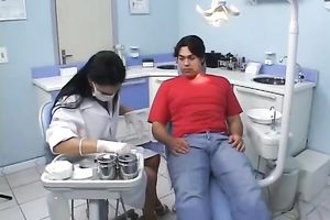 Hot dentist seduces a client and gives him a stunning fellatio