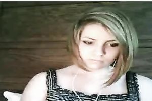 Busty red-haired sweetheart shows off her charms on cam