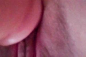 Closeup - diddling my wife's pink creamy bawdy cleft with large sex toy