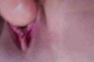 Closeup - diddling my wife's pink creamy bawdy cleft with large sex toy