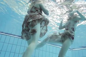 Aesthetic beauty of an underwater erotic movie with 2 legal age teenagers