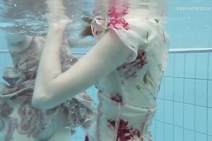Aesthetic beauty of an underwater erotic movie with 2 legal age teenagers