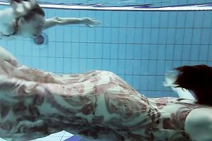 Aesthetic beauty of an underwater erotic movie with 2 legal age teenagers