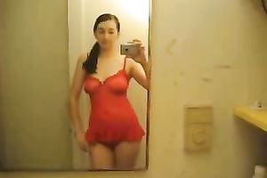 Young dilettante girlfriend films her hawt body in nature's garb in the bath