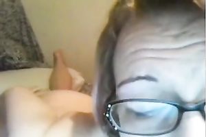Aged slutty wife in glasses pleases herself with fingers and a sex tool