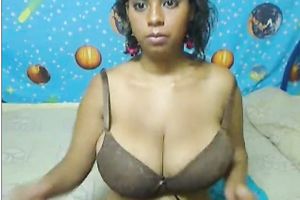 Latina black skin cutie with biggest knockers on cam