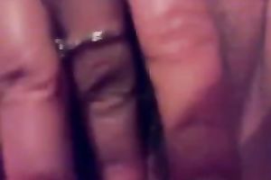 My vehement husband entertains herself by fucking her cookie with a toy