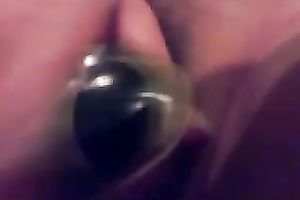 My vehement husband entertains herself by fucking her cookie with a toy