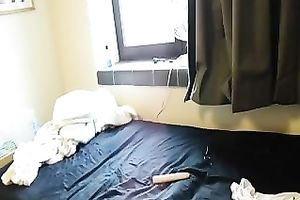 Sexy foureyed roommate masturbating with large fake penis