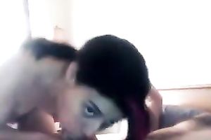 Raven haired wifey of my buddy knows how to engulf his knob perfectly well