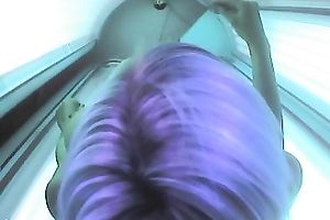 Bosomy playgirl caught fingering her snatch in a solarium