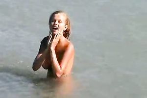 My charming European golden-haired GF on the beach all in nature's garb