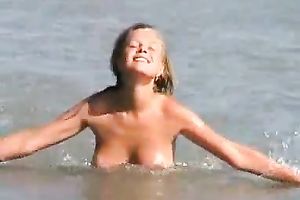 My charming European golden-haired GF on the beach all in nature's garb