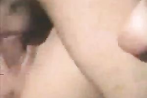 Bootylicious dark brown slut riding a man on the sofa