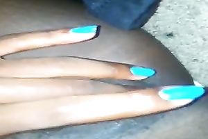 Lewd dark skinned nympho with blue manicure was teasing her wet twat