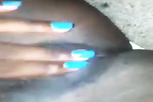 Lewd dark skinned nympho with blue manicure was teasing her wet twat
