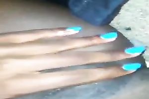 Lewd dark skinned nympho with blue manicure was teasing her wet twat