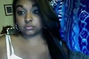 Cute and hot brown skin sweetie flashes her mangos on cam