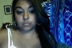 Cute and hot brown skin sweetie flashes her mangos on cam