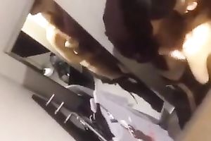 Mutual perverted spooning in the changing room by some Asian pair