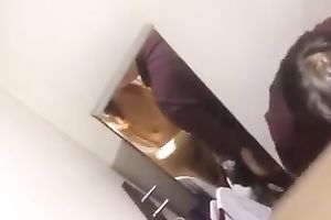 Mutual perverted spooning in the changing room by some Asian pair