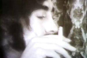 Dark head immodest tramp is willing to serve several palpitating jocks at one time