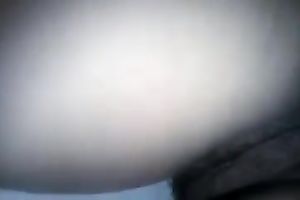 Petite hirsute snatch filmed from behind on homemade clip