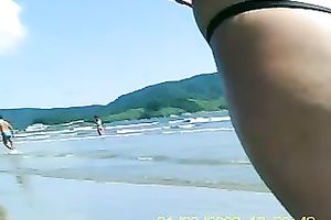 Big hawt asses at the beach full of half bare horny hotties