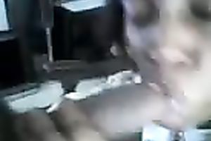 Black doxy engulfing my ramrod during the time that twat is plugged with sex toy