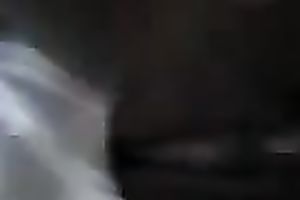 Black doxy engulfing my ramrod during the time that twat is plugged with sex toy