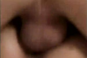 Busty girlfriend rides her fellow on the dining table in the kitchen