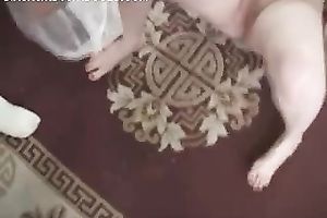 Teenage sweetie inserts a banana in her bald punani