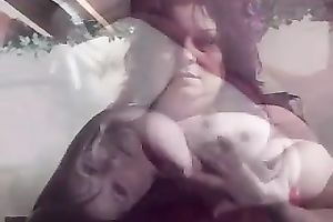 Chubby spunky brunette hair shows off her giant natural mounds