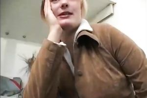 Chubby older blonde female gives interview and strips