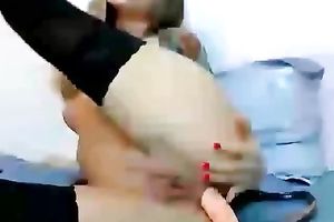 Svelte lengthy haired wife in nylons was rubbing and petting snatch with toy