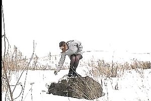 Cute youthful white honey pissing outside in a snowy day