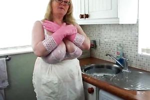My kewl aged Russian amateur wife does kitchen work exposing her giant boobs