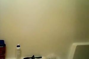 Great looking legal age teenager with jet dark hair puts on a fine livecam show