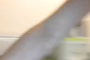 Attractive Asian sexpot shoving constricted slit with large sex toy