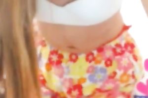 Adorable legal age teenager showing her stomach button and curly pussy