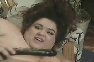 Outrageous SSBBW dark brown black cock slut pokes her pussy and a-hole with sex toys