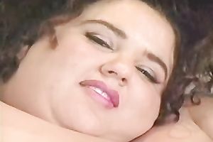 Outrageous SSBBW dark brown black cock slut pokes her pussy and a-hole with sex toys