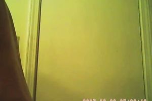 Nasty aged woman stripping in a changing room so this babe receive caught on web camera