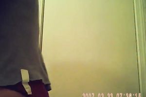 Nasty aged woman stripping in a changing room so this babe receive caught on web camera