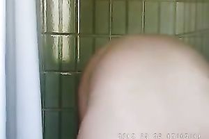 Busty amateur Paki babe in the shower room on camera