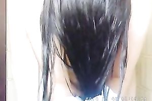 Busty amateur Paki babe in the shower room on camera