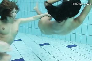 Two new European hawt nubiles underwater showing bodies