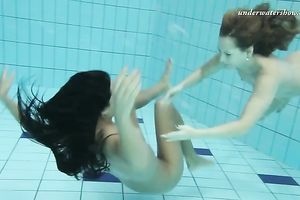 Two new European hawt nubiles underwater showing bodies